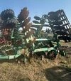 Універсальний дисковий агрегат БІЛОЦЕРКІВМАЗ УДА 6,1, 40 дисків, 3 котки, б/в - 2