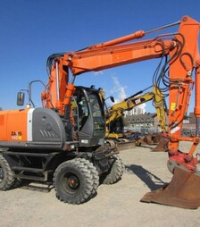 Екскаватор колісний HITACHI ZX 140, 2011 р.в., 5490 м/год, б/в