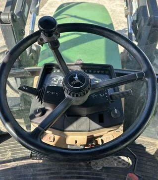 Трактор John Deere 6506 с фронтальным погрузчиком, 1996 г.в, 12110 м/ч, б/у