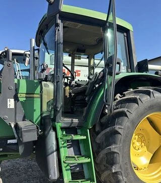 Трактор John Deere 6506 с фронтальным погрузчиком, 1996 г.в, 12110 м/ч, б/у