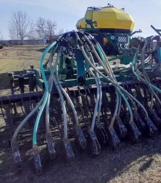 Посівний комплекс John Deere 730, 10,9 м + бункер John Deere 1910, б/в