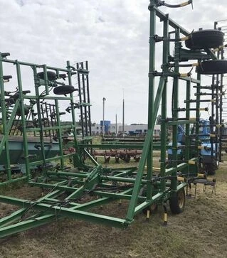 Культиватор John Deere 1000, 11,2 м, з пружинною бороною, б/в