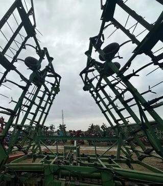 Культиватор John Deere 980, 12,5 м, с пружинной бороной, б/у