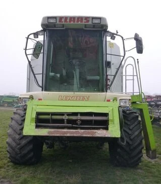 Зернозбиральний комбайн Claas Lexion 460, 1999 р.в. + жниварка С750, транспортний візок, б/в