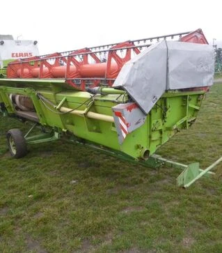 Зернозбиральний комбайн Claas Lexion 460, 1999 р.в. + жниварка С750, транспортний візок, б/в