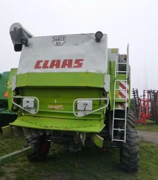 Зернозбиральний комбайн Claas Lexion 460, 1999 р.в. + жниварка С750, транспортний візок, б/в