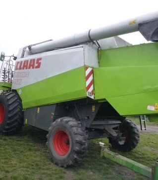 Зернозбиральний комбайн Claas Lexion 460, 1999 р.в. + жниварка С750, транспортний візок, б/в