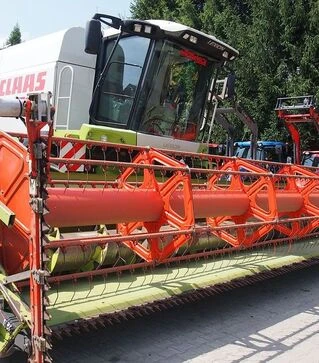 Зернозбиральний комбайн Claas Lexion 570, 2100 м/год, б/в