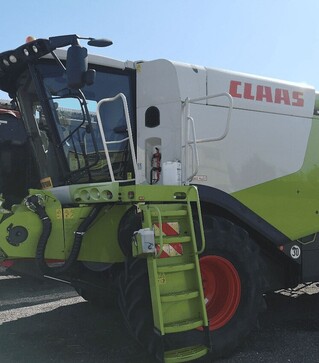 Зернозбиральний комбайн Claas Lexion 670, 5000 м/год, б/в