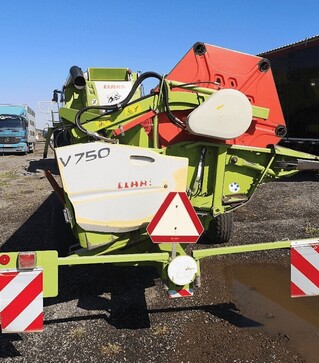 Зернозбиральний комбайн Claas Lexion 670, 5000 м/год, б/в