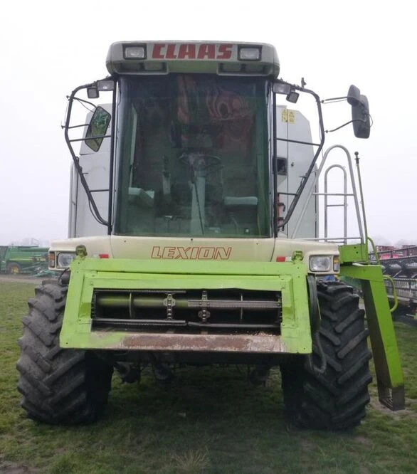 Зернозбиральний комбайн Claas Lexion 460, 1999 р.в. + жниварка С750, транспортний візок, б/в
