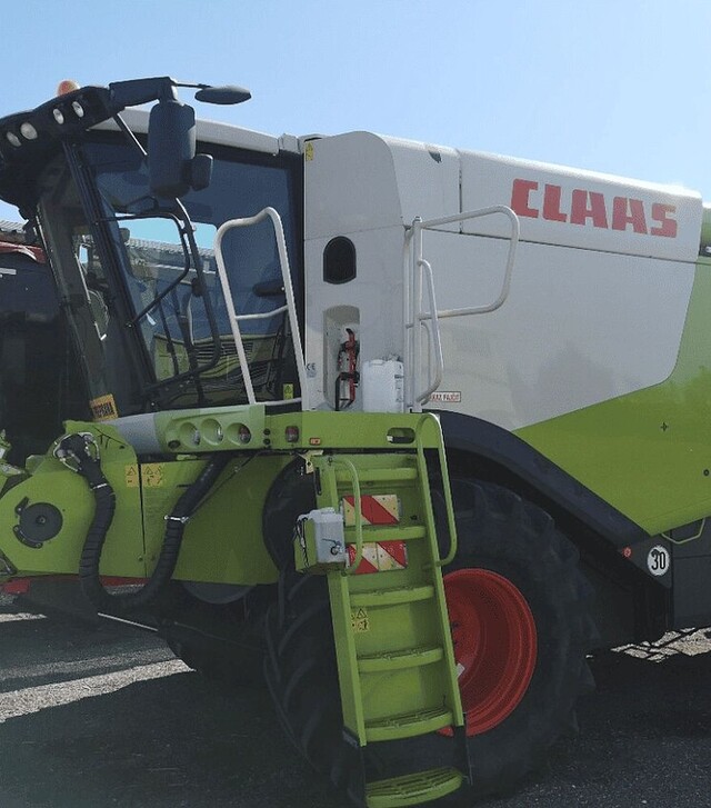 Зернозбиральний комбайн Claas Lexion 670, 5000 м/год, б/в